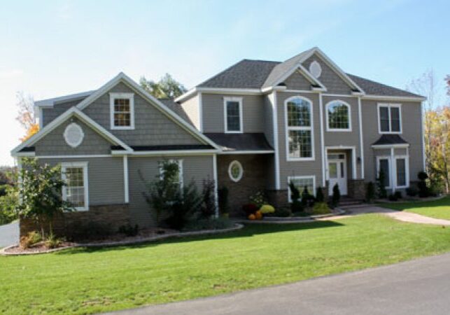 A large house with many windows and doors.